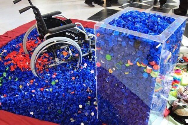 شعار هر 100هزار درب بطری یک ویلچر